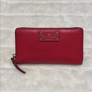 Kate Spade Red Pebbled Leather Zip Around Wallet with Logo Plate